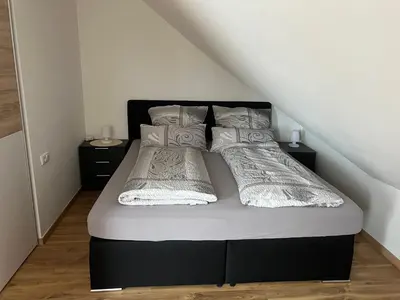 Ein Bett oder Betten in einem Zimmer der Unterkunft Hinter-Apartments-Nord