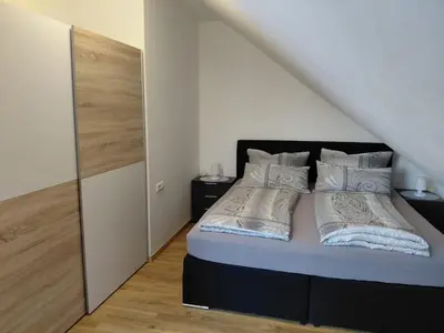 Ein Bett oder Betten in einem Zimmer der Unterkunft Hinter-Apartments-Nord