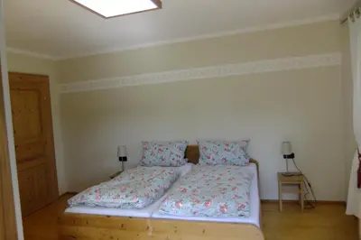 Ein Bett oder Betten in einem Zimmer der Unterkunft Zehentmayrhof