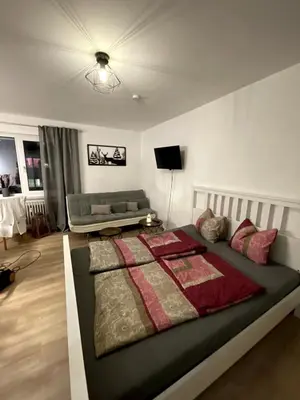 Ein Bett oder Betten in einem Zimmer der Unterkunft Cozy studio in Garmisch, central, mountain view