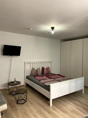 Ein Bett oder Betten in einem Zimmer der Unterkunft Cozy studio in Garmisch, central, mountain view