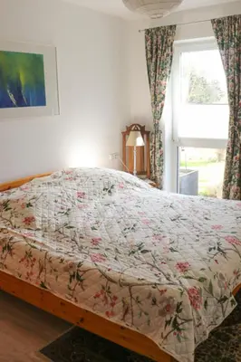 Ein Bett oder Betten in einem Zimmer der Unterkunft Idyllisches Apartment mit 2 Schlafzimmer