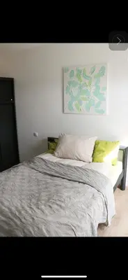 Ein Bett oder Betten in einem Zimmer der Unterkunft Idyllisches Apartment mit 2 Schlafzimmer