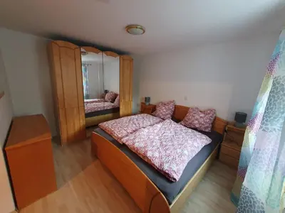Ein Bett oder Betten in einem Zimmer der Unterkunft Ferienwohnung am Kittenbach