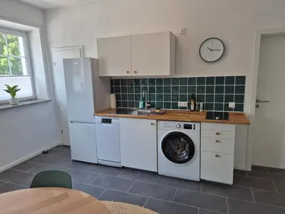 Küche/Küchenzeile in der Unterkunft Suite 1 - Apartments am Schloss