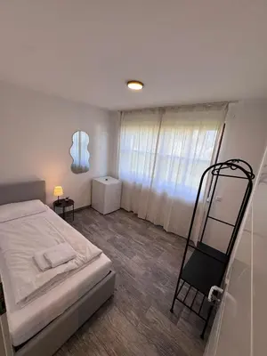 Ein Bett oder Betten in einem Zimmer der Unterkunft Bavaria Home Apartment Rohrbach