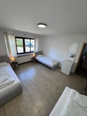 Ein Bett oder Betten in einem Zimmer der Unterkunft Bavaria Home Apartment Rohrbach