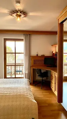 Ein Bett oder Betten in einem Zimmer der Unterkunft Panorama 17 - Einzigartige Ferienwohnung am Tegernsee