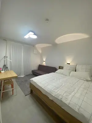 Ein Bett oder Betten in einem Zimmer der Unterkunft Tegernsee modern apartment, free parking
