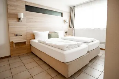 Ein Bett oder Betten in einem Zimmer der Unterkunft Ferienwohnungen Steinbacher