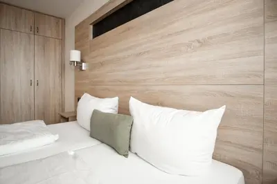 Ein Bett oder Betten in einem Zimmer der Unterkunft Ferienwohnungen Steinbacher