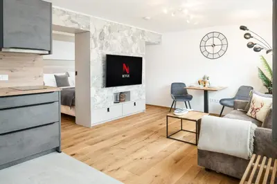 TV/Unterhaltungsangebot in der Unterkunft FENJOY Ferienapartments Bernau am Chiemsee