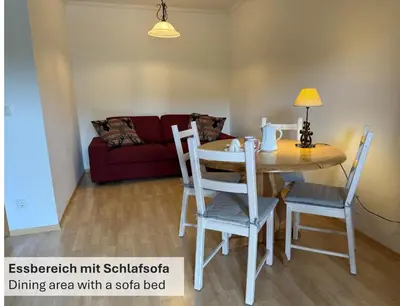 Ein Sitzbereich in der Unterkunft Seeblick Apartment am Walchensee
