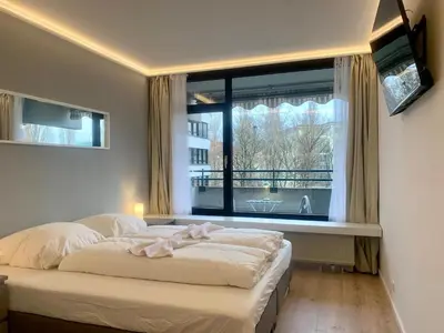 Ein Bett oder Betten in einem Zimmer der Unterkunft Apartment in central location with free parking space