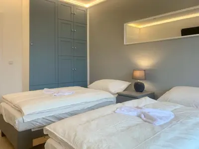Ein Bett oder Betten in einem Zimmer der Unterkunft Apartment in central location with free parking space