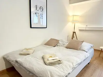 Ein Bett oder Betten in einem Zimmer der Unterkunft Modern Quiet Studio Central Munich