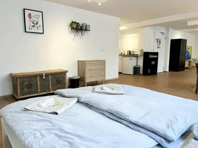 Ein Bett oder Betten in einem Zimmer der Unterkunft Modern Quiet Studio Central Munich