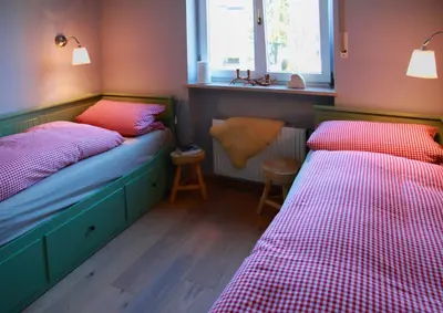 Ein Bett oder Betten in einem Zimmer der Unterkunft AlexaFerien