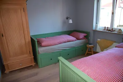 Ein Bett oder Betten in einem Zimmer der Unterkunft AlexaFerien