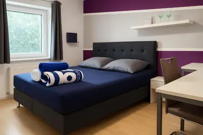Ein Bett oder Betten in einem Zimmer der Unterkunft Bockhorn Farmhouse