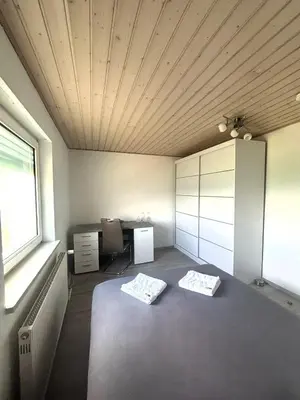 Ein Bett oder Betten in einem Zimmer der Unterkunft Bockhorn Farmhouse
