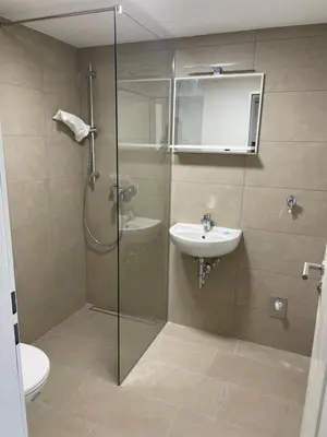 Ein Badezimmer in der Unterkunft Living 7 Apartments