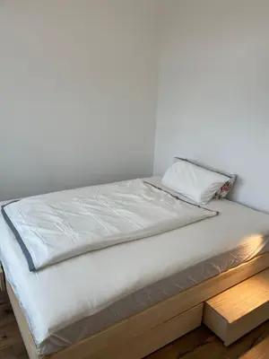 Ein Bett oder Betten in einem Zimmer der Unterkunft Living 7 Apartments