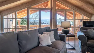 Ein Sitzbereich in der Unterkunft Alpenchalet am Hirschbach