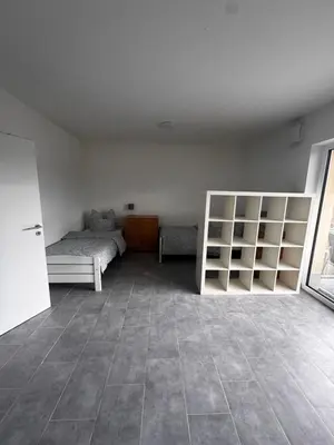 Ein Bett oder Betten in einem Zimmer der Unterkunft Bade Apartments Steinhöring
