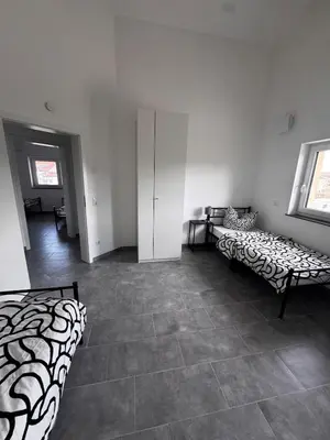 Ein Bett oder Betten in einem Zimmer der Unterkunft Bade Apartments Steinhöring