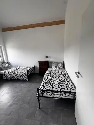 Ein Bett oder Betten in einem Zimmer der Unterkunft Bade Apartments Steinhöring