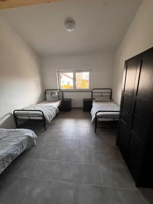 Ein Bett oder Betten in einem Zimmer der Unterkunft Bade Apartments Steinhöring