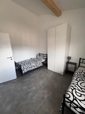 Ein Bett oder Betten in einem Zimmer der Unterkunft Bade Apartments Steinhöring