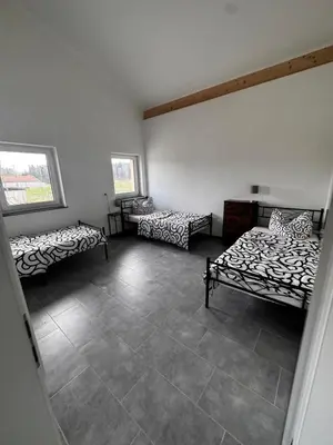 Ein Bett oder Betten in einem Zimmer der Unterkunft Bade Apartments Steinhöring