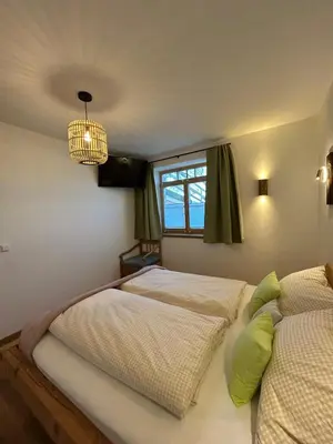 Ein Bett oder Betten in einem Zimmer der Unterkunft Ferienwohung Dennabruck mit Whirlpool