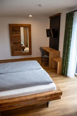 Ein Bett oder Betten in einem Zimmer der Unterkunft Gasthaus Hansch