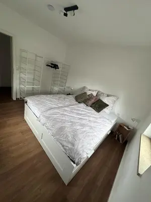 Ein Bett oder Betten in einem Zimmer der Unterkunft City Apartment Hettenbach