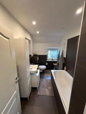 Ein Badezimmer in der Unterkunft City Apartment Hettenbach