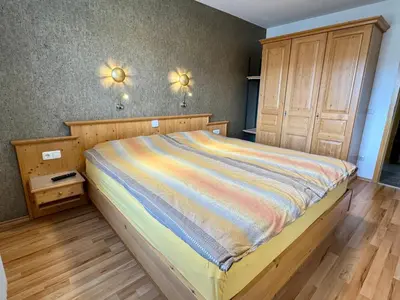 Ein Bett oder Betten in einem Zimmer der Unterkunft Ferienhaus-31 in Lechbruck am See, 4 Sterne zertifiziert, Allgäu