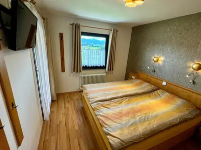 Ein Bett oder Betten in einem Zimmer der Unterkunft Ferienhaus-31 in Lechbruck am See, 4 Sterne zertifiziert, Allgäu