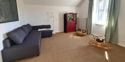 Ein Sitzbereich in der Unterkunft Haus am Bach