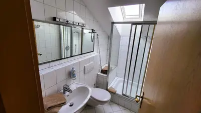 Ein Badezimmer in der Unterkunft Haus Hörterer | Chiemgau Karte