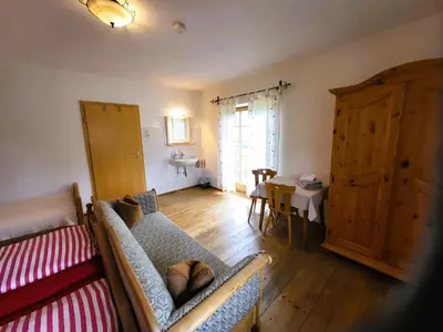 Ein Sitzbereich in der Unterkunft Haus Hörterer | Chiemgau Karte