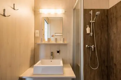 Ein Badezimmer in der Unterkunft FairSleep Motel Einstein Erding