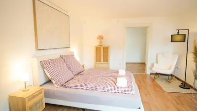 Ein Bett oder Betten in einem Zimmer der Unterkunft Papyrer Apartment - Stilvolles Apartment in Lenggries