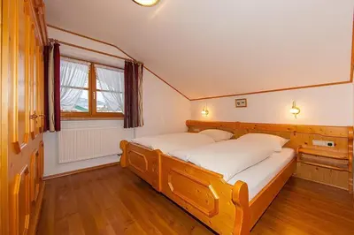 Ein Bett oder Betten in einem Zimmer der Unterkunft Ferienwohnungen Annette