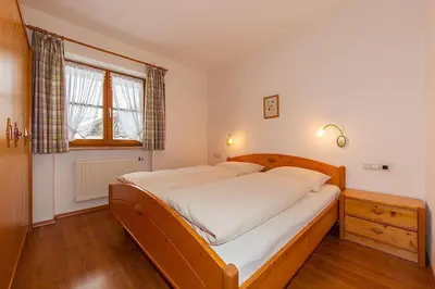 Ein Bett oder Betten in einem Zimmer der Unterkunft Ferienwohnungen Annette