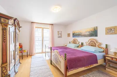 Ein Bett oder Betten in einem Zimmer der Unterkunft Ferienwohnung Bernauer Ache
