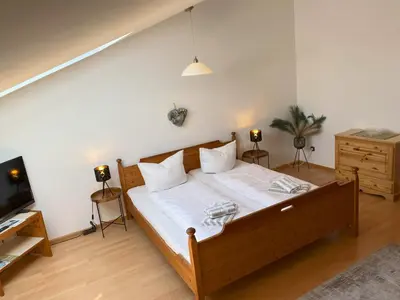 Ein Bett oder Betten in einem Zimmer der Unterkunft Gschwendtnerhof App24 Nöthen