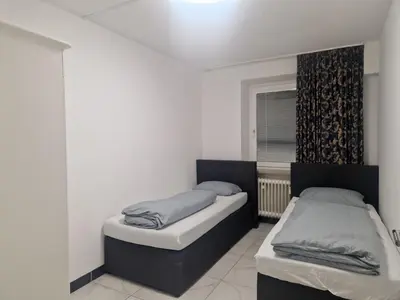 Ein Bett oder Betten in einem Zimmer der Unterkunft Hanin 11